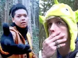 Paul Logan holding hand to mouth