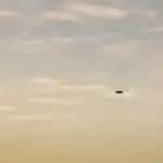 Three UFO's are intercepted by F-22 Raptors over the Nevada desert.